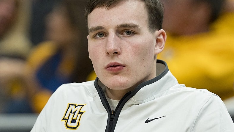 Mar 6, 2024; Milwaukee, Wisconsin, USA;  Marquette Golden Eagles guard Tyler Kolek looks on from the bench during the second half against the Connecticut Huskies at Fiserv Forum. Mandatory Credit: Jeff Hanisch-USA TODAY Sports