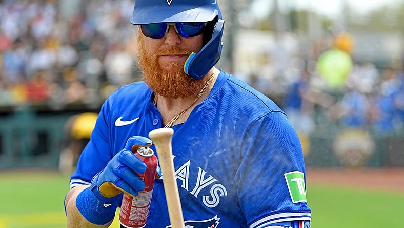 Blue Jays' Justin Turner (#2) uses some spray for a better grip. Pittsburgh Pirates with a dramatic 6-5 win over the Toronto Blue Jays on Tuesday March, 5, 2024, with an official attendance of 5,322 at LECOM Park formerly known as McKechnie Field located in Bradenton, Florida.