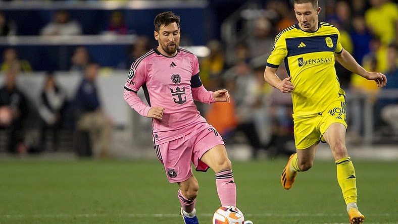 Mar 7, 2024; Nashville, TN, USA; Inter Miami forward Lionel Messi (10) dribbles against the Nashville SC during the second half at GEODIS Park. Mandatory Credit: Steve Roberts-USA TODAY Sports