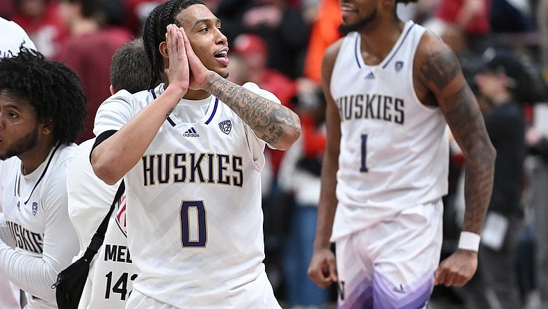 Mar 7, 2024; Pullman, Washington, USA; Washington Huskies guard Koren Johnson (0) celebrates after a game against the Washington State Cougars at Friel Court at Beasley Coliseum. Washington Huskies won 74-68. Mandatory Credit: James Snook-USA TODAY Sports