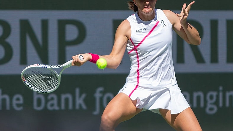 Iga Swiatek keeps her eyes on the ball against Danielle Collins during a second round BNP Paribas Open match at Indian Wells Tennis Garden in Indian Wells, California, on March 8, 2024.