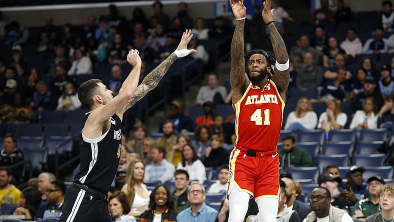 Mar 8, 2024; Memphis, Tennessee, USA; Atlanta Hawks forward Saddiq Bey (41) shoots for three as Memphis Grizzlies guard John Konchar (46) defends during the first half at FedExForum. Mandatory Credit: Petre Thomas-USA TODAY Sports