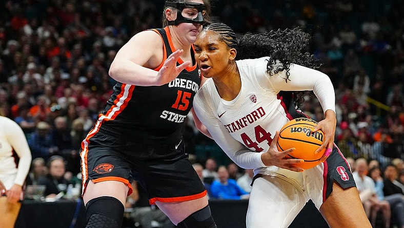 Mar 8, 2024; Las Vegas, NV, USA; Stanford Cardinal forward Kiki Iriafen (44) drives the lane against Oregon State Beavers forward Raegan Beers (15) during the fourth quarter at MGM Grand Garden Arena. Mandatory Credit: Stephen R. Sylvanie-USA TODAY Sports