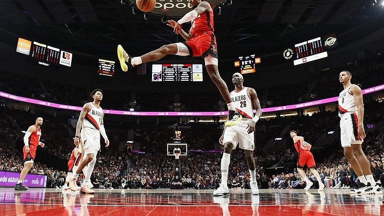Mar 8, 2024; Portland, Oregon, USA; Houston Rockets shooting guard Jalen Green (4) dunks the ball during the first half against the Portland Trail Blazers at Moda Center. Mandatory Credit: Soobum Im-USA TODAY Sports
