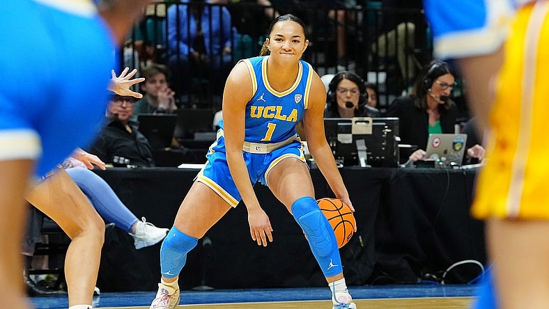Mar 8, 2024; Las Vegas, NV, USA; UCLA Bruins guard Kiki Rice (1) dribbles against the USC Trojans during the first quarter at MGM Grand Garden Arena. Mandatory Credit: Stephen R. Sylvanie-USA TODAY Sports
