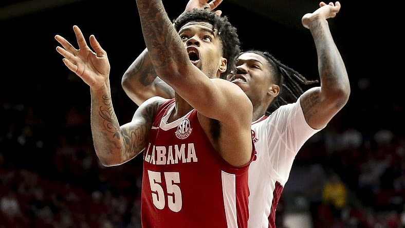 Mar 9, 2024; Tuscaloosa, Alabama, USA;  Alabama Crimson Tide guard Aaron Estrada goes to the hoop against Arkansas Razorbacks at Coleman Coliseum. Mandatory Credit: Gary Cosby Jr.-USA TODAY Sports