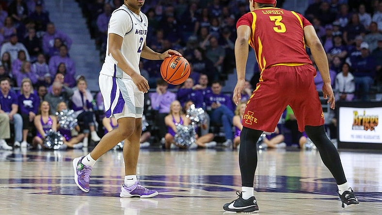 Mar 9, 2024; Manhattan, Kansas, USA; Kansas State Wildcats guard Tylor Perry (2) brings the ball up court against Iowa State Cyclones guard Tamin Lipsey (3) doing the first half at Bramlage Coliseum. Mandatory Credit: Scott Sewell-USA TODAY Sports