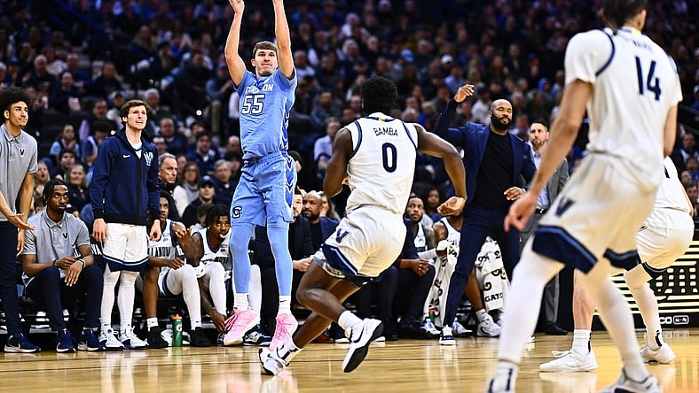Mar 9, 2024; Philadelphia, Pennsylvania, USA; Creighton Bluejays guard Baylor Scheierman (55) shoots over Villanova Wildcats guard TJ Bamba (0) in the first half at Wells Fargo Center. Mandatory Credit: Kyle Ross-USA TODAY Sports