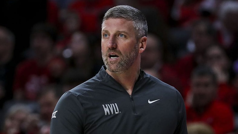 Mar 9, 2024; Cincinnati, Ohio, USA; West Virginia Mountaineers interim head coach Josh Eilert during the first half against the Cincinnati Bearcats at Fifth Third Arena. Mandatory Credit: Katie Stratman-USA TODAY Sports