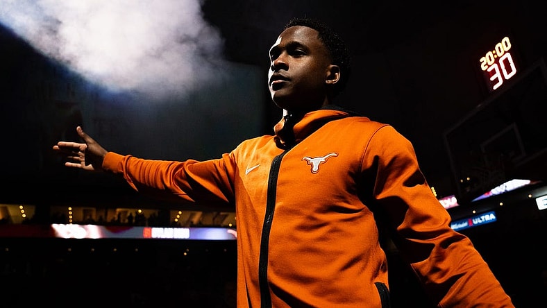 Texas Longhorns guard Max Abmas (3) gives out high-fives during the starting line-up announcement ahead of the Longhorns' game against the Oklahoma Sooners at the Moody Center in Austin, Saturday, March 9, 2024. Texas won the game 94-80.