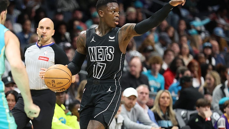 Mar 9, 2024; Charlotte, North Carolina, USA;  Brooklyn Nets guard Dennis Schroder (17) directs the play against the Charlotte Hornets during the first quarter at Spectrum Center. Mandatory Credit: Cory Knowlton-USA TODAY Sports