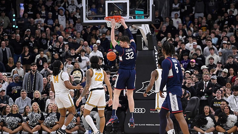 Mar 9, 2024; Providence, Rhode Island, USA: Connecticut Huskies center Donovan Clingan (32) makes a basket against the Providence Friars during the first half at Amica Mutual Pavilion. Mandatory Credit: Eric Canha-USA TODAY Sports