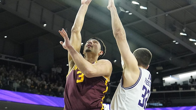 Mar 9, 2024; Evanston, Illinois, USA; Northwestern Wildcats forward Blake Preston (32) defends Minnesota Golden Gophers forward Dawson Garcia (3) during the first half at Welsh-Ryan Arena. Mandatory Credit: David Banks-USA TODAY Sports