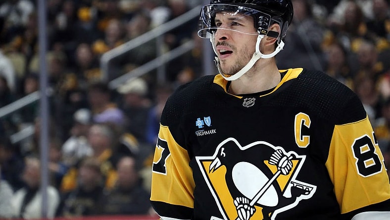Mar 10, 2024; Pittsburgh, Pennsylvania, USA;  Pittsburgh Penguins center Sidney Crosby (87) looks on against the Edmonton Oilers during the second period at PPG Paints Arena. Mandatory Credit: Charles LeClaire-USA TODAY Sports