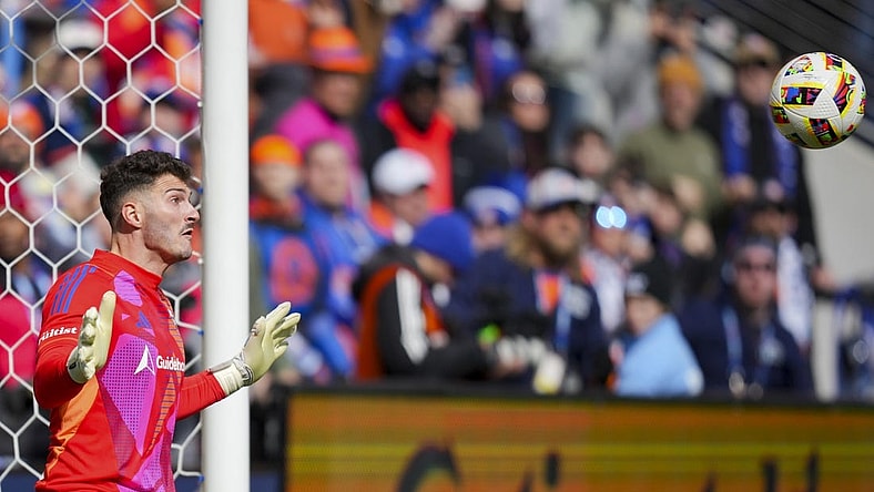 Mar 10, 2024; Cincinnati, Ohio, USA;  D.C. United goalkeeper Alex Bono (24) makes a save in net against FC Cincinnati in the first half at TQL Stadium. Mandatory Credit: Aaron Doster-USA TODAY Sports