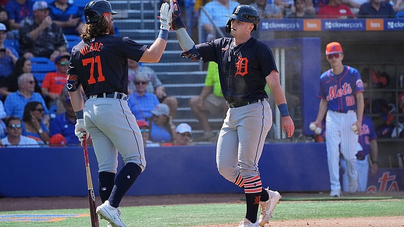 Mar 10, 2024; Port St. Lucie, Florida, USA;  Detroit Tigers second baseman Jace Jung (84) is congratulated by first baseman Ryan Vilade (71) for scoring a run in the eighth inning against the New York Mets at Clover Park. Mandatory Credit: Jim Rassol-USA TODAY Sports