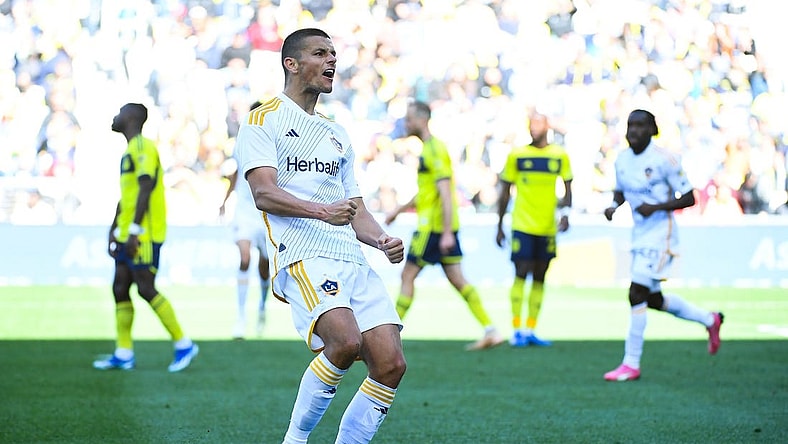 Mar 10, 2024; Nashville, Tennessee, USA; LA Galaxy forward Dejan Joveljic (9) celebrates scoring a goal against Nashville SC during the second half at Geodis Park. Mandatory Credit: Christopher Hanewinckel-USA TODAY Sports