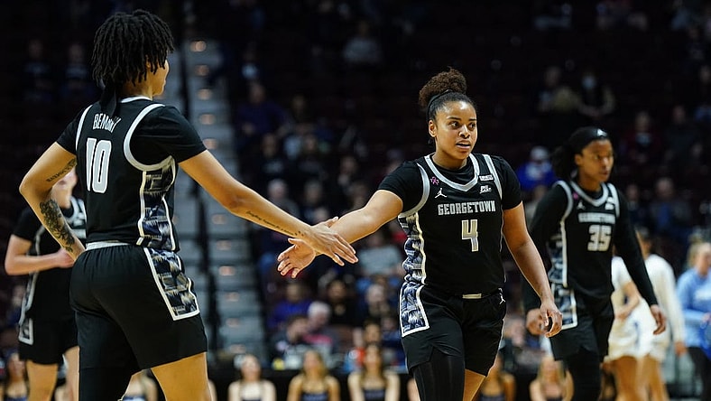Mar 10, 2024; Uncasville, CT, USA; Georgetown Hoyas guard Alex Cowan (4) and forward Mya Bembry (10) react after a play in the first half at Mohegan Sun Arena. Mandatory Credit: David Butler II-USA TODAY Sports