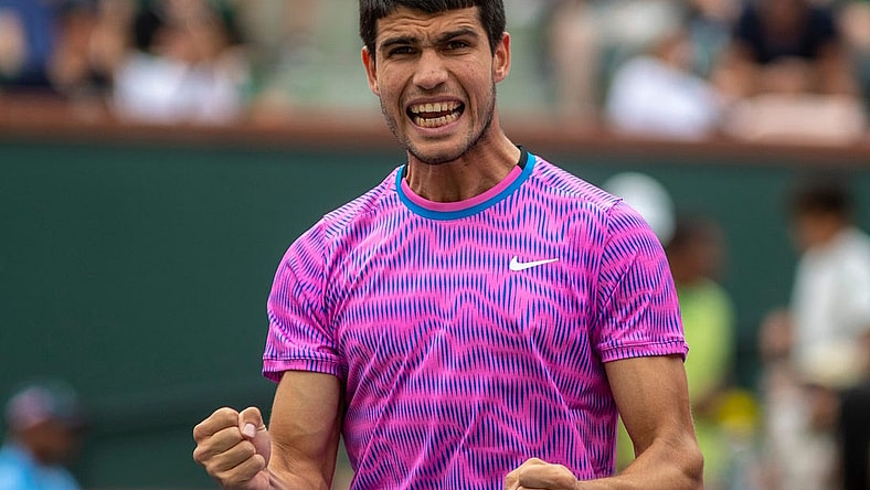 Carlos Alcaraz celebrates winning his match over Felix Auger-Aliassime during round three of the BNP Paribas Open in Indian Wells, Calif., Sunday, March 10, 2024.