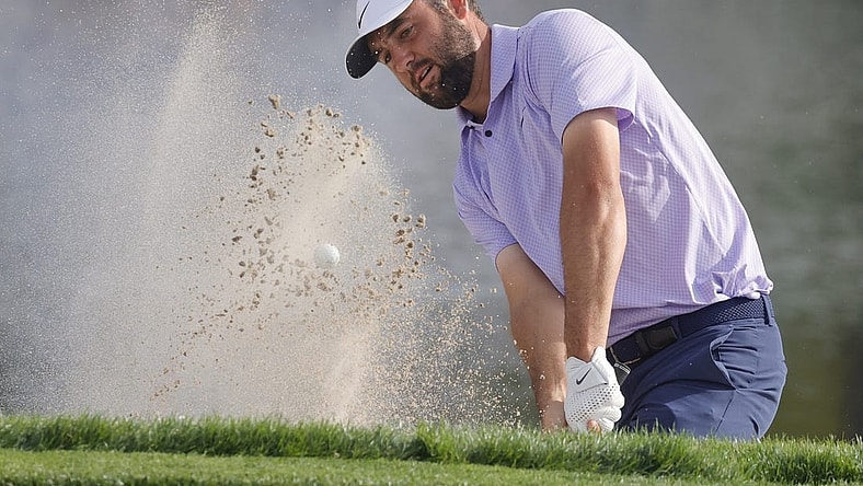Mar 10, 2024; Orlando, Florida, USA;  Scottie Scheffler hits from the bunker on the 17th hole during the final round of the Arnold Palmer Invitational golf tournament. Mandatory Credit: Reinhold Matay-USA TODAY Sports