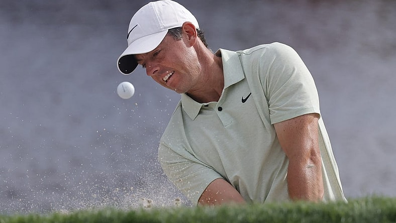 Mar 10, 2024; Orlando, Florida, USA;  Rory McIlroy hits from the bunker on the 17th green during the final round of the Arnold Palmer Invitational golf tournament. Mandatory Credit: Reinhold Matay-USA TODAY Sports