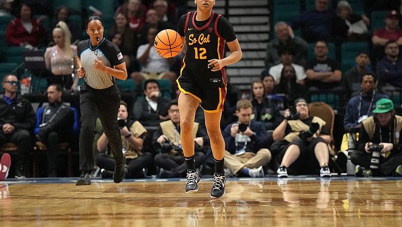 Mar 10, 2024; Las Vegas, NV, USA; Southern California Trojans guard JuJu Watkins (12) dribbles the ball against the Stanford Cardinal in the second half of the Pac-12 Tournament women's championship game at MGM Grand Garden Arena. Mandatory Credit: Kirby Lee-USA TODAY Sports