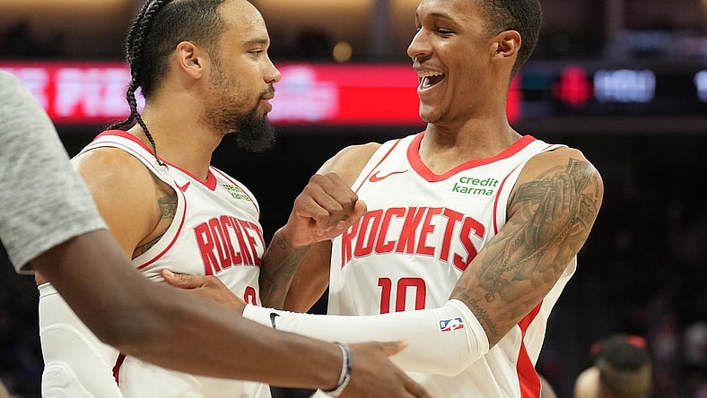 Mar 10, 2024; Sacramento, California, USA; Houston Rockets forwards Dillon Brooks (left) and Jabari Smith Jr. (right) celebrate after defeating the Sacramento Kings at Golden 1 Center. Mandatory Credit: Darren Yamashita-USA TODAY Sports