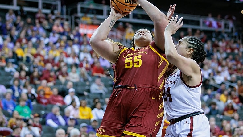 Mar 11, 2024; Kansas City, MO, USA; Iowa State Cyclones center Audi Crooks (55) shoots the ball around Oklahoma Sooners forward Skylar Vann (24) during the second half at T-Mobile Center. Mandatory Credit: William Purnell-USA TODAY Sports