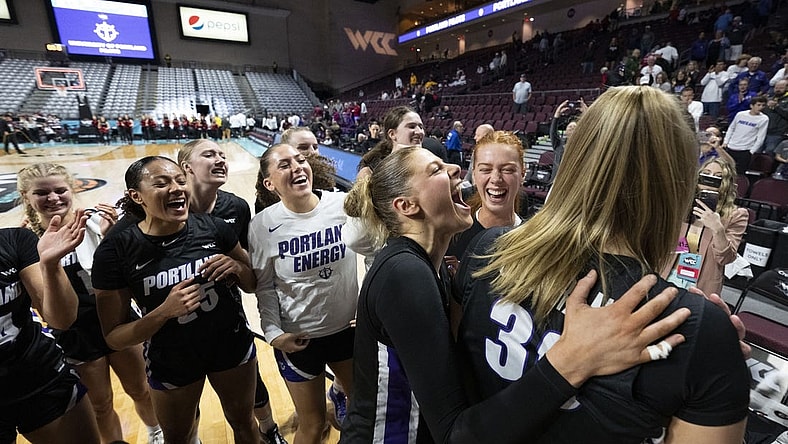 March 11, 2024; Las Vegas, NV, USA; Portland Pilots forward Kennedy Dickie (12) celebrates with forward Lucy Cochrane (30) against the Santa Clara Broncos after the game in the semifinals of the WCC Basketball Championship at Orleans Arena. Mandatory Credit: Kyle Terada-USA TODAY Sports