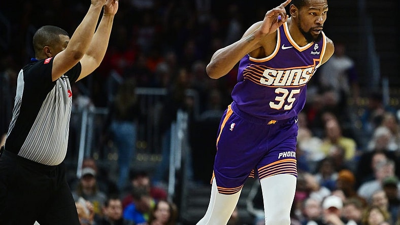 Mar 11, 2024; Cleveland, Ohio, USA; Phoenix Suns forward Kevin Durant (35) celebrates after hitting a three point basket during the second half against the Cleveland Cavaliers at Rocket Mortgage FieldHouse. Mandatory Credit: Ken Blaze-USA TODAY Sports