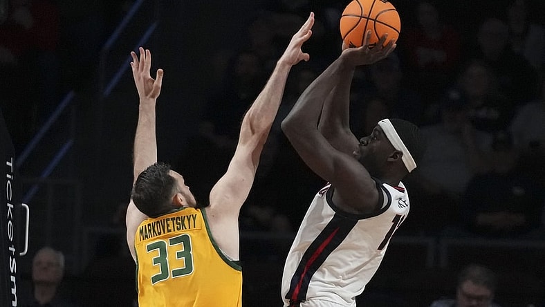 March 11, 2024; Las Vegas, NV, USA; Gonzaga Bulldogs forward Graham Ike (13) shoots the basketball against San Francisco Dons center Volodymyr Markovetskyy (33) during the first half in the semifinals of the WCC Basketball Championship at Orleans Arena. Mandatory Credit: Kyle Terada-USA TODAY Sports
