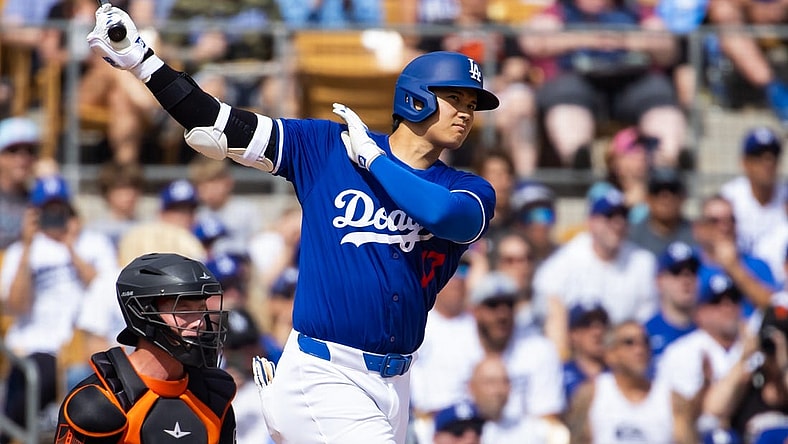Mar 12, 2024; Phoenix, Arizona, USA; Los Angeles Dodgers designated hitter Shohei Ohtani against the San Francisco Giants during a spring training baseball game at Camelback Ranch-Glendale. Mandatory Credit: Mark J. Rebilas-USA TODAY Sports