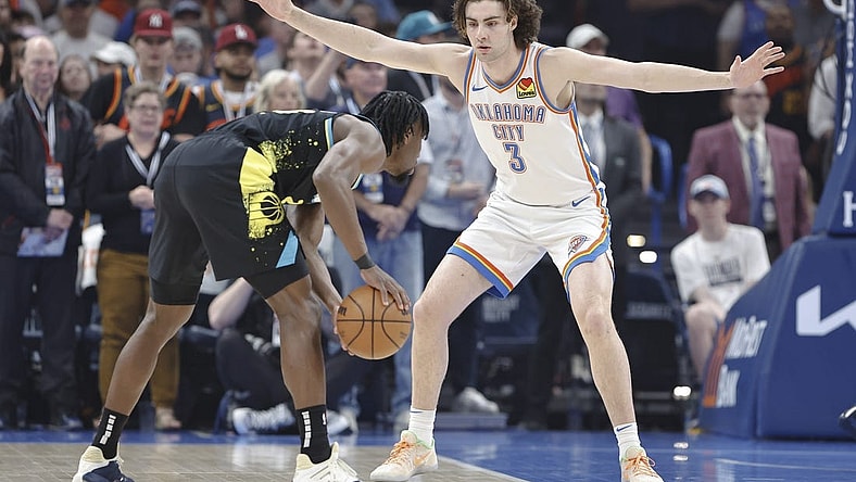 Mar 12, 2024; Oklahoma City, Oklahoma, USA; Oklahoma City Thunder guard Josh Giddey (3) defends Indiana Pacers forward Aaron Nesmith (23) during the first quarter at Paycom Center. Mandatory Credit: Alonzo Adams-USA TODAY Sports