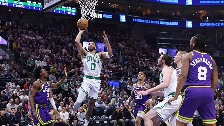 Mar 12, 2024; Salt Lake City, Utah, USA; Boston Celtics forward Jayson Tatum (0) lays the ball up against the Utah Jazz during the first quarter at Delta Center. Mandatory Credit: Rob Gray-USA TODAY Sports