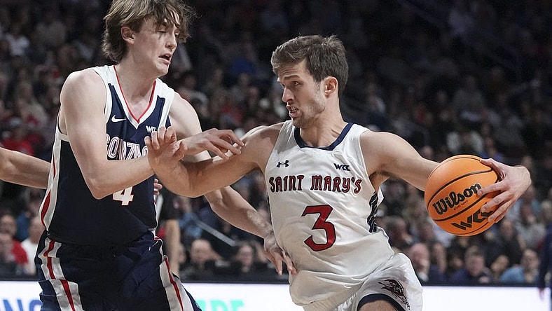 March 12, 2024; Las Vegas, NV, USA; Saint Mary's Gaels guard Augustas Marciulionis (3) dribbles the basketball against Gonzaga Bulldogs guard Dusty Stromer (4) during the first half in the finals of the WCC Basketball Championship at Orleans Arena. Mandatory Credit: Kyle Terada-USA TODAY Sports