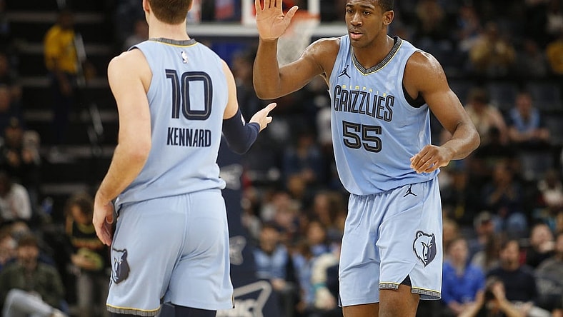 Mar 12, 2024; Memphis, Tennessee, USA; Memphis Grizzlies center Trey Jemison (55) reacts with guard Luke Kennard (10) during the second half against the Washington Wizards at FedExForum. Mandatory Credit: Petre Thomas-USA TODAY Sports