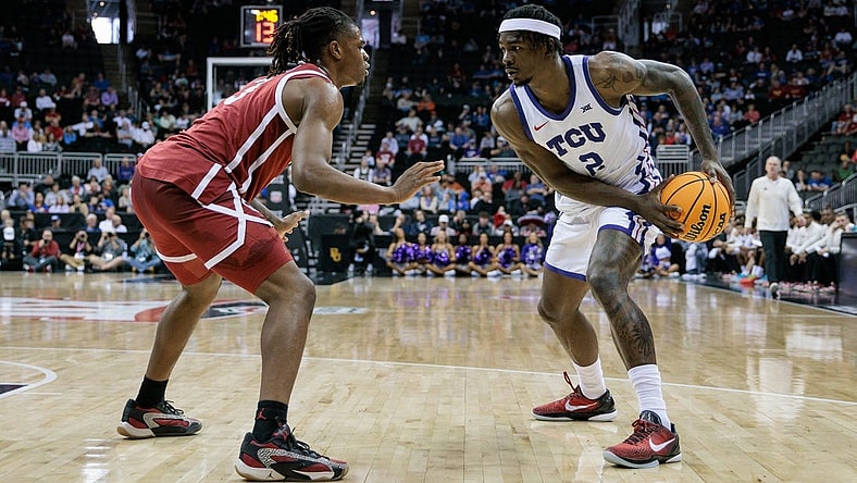 Mar 13, 2024; Kansas City, MO, USA; Oklahoma Sooners guard Otega Oweh (3) guards TCU Horned Frogs forward Emanuel Miller (2) during the first half at T-Mobile Center. Mandatory Credit: William Purnell-USA TODAY Sports