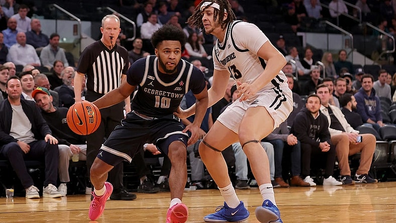 Mar 13, 2024; New York City, NY, USA; Georgetown Hoyas guard Jayden Epps (10) drives to the basket against Providence Friars forward Josh Oduro (13) during the first half at Madison Square Garden. Mandatory Credit: Brad Penner-USA TODAY Sports