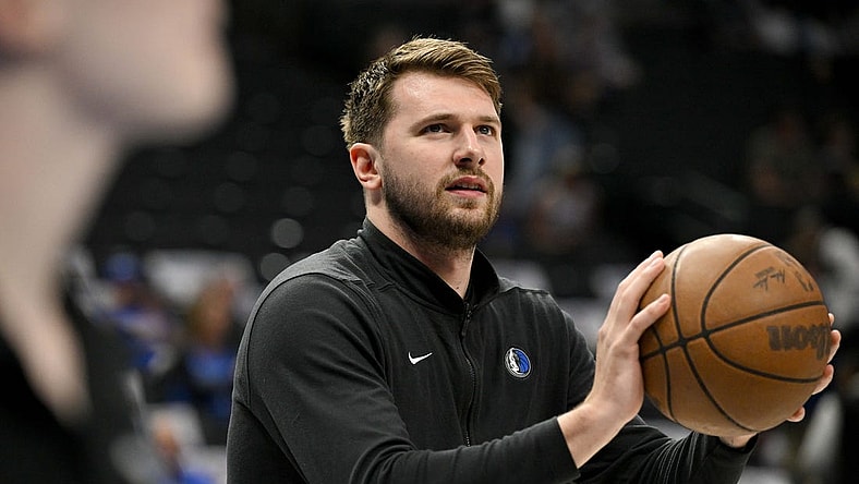 Mar 13, 2024; Dallas, Texas, USA; Dallas Mavericks guard Luka Doncic (77) warms up before the game between the Dallas Mavericks and the Golden State Warriors at the American Airlines Center. Mandatory Credit: Jerome Miron-USA TODAY Sports
