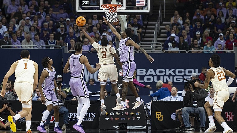Mar 13, 2024; Kansas City, MO, USA; Texas Longhorns guard Max Abmas (3) shoots the ball while defended by Kansas State Wildcats guard Cam Carter (5) during the first half at T-Mobile Center. Mandatory Credit: Amy Kontras-USA TODAY Sports