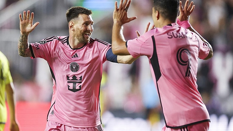 Mar 13, 2024; Fort Lauderdale, FL, USA;  Inter Miami CF forward Lionel Messi (10) celebrates after scoring a goal with forward Luis Suarez (9) against the Nashville SC in the first half during the Concacaf round of sixteen at Chase Stadium. Mandatory Credit: Nathan Ray Seebeck-USA TODAY Sports