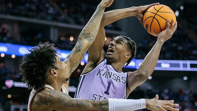 Mar 13, 2024; Kansas City, MO, USA; Kansas State Wildcats forward David N'Guessan (1) shoots the ball during the second half against the Texas Longhorns at T-Mobile Center. Mandatory Credit: William Purnell-USA TODAY Sports