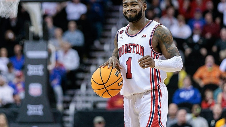 Mar 14, 2024; Kansas City, MO, USA; Houston Cougars guard Jamal Shead (1) brings the ball up court during the first half against the TCU Horned Frogs at T-Mobile Center. Mandatory Credit: William Purnell-USA TODAY Sports