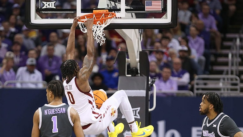 Iowa State senior forward Tre King (0) dunks over Kansas State in the first half of the quarterfinal round in the Big 12 Tournament inside the T-Mobile Center in Kansas City, Mo.