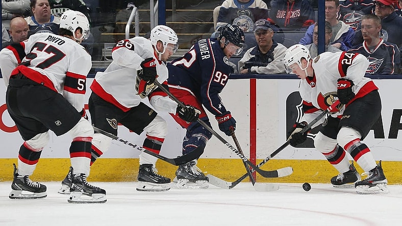 Mar 14, 2024; Columbus, Ohio, USA; Columbus Blue Jackets left wing Alexander Nylander (92) battles with Ottawa Senators defenseman Jacob Bernard-Docker (24) for the puck during the first period at Nationwide Arena. Mandatory Credit: Russell LaBounty-USA TODAY Sports