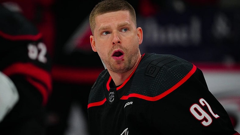 Mar 14, 2024; Raleigh, North Carolina, USA; Carolina Hurricanes center Evgeny Kuznetsov (92) looks on against the Florida Panthers during the warmups before the game against the Florida Panthers at PNC Arena. Mandatory Credit: James Guillory-USA TODAY Sports
