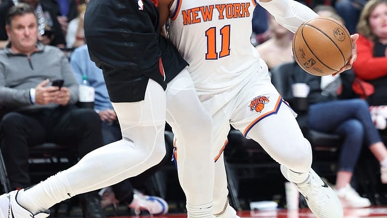 Mar 14, 2024; Portland, Oregon, USA; New York Knicks guard Jalen Brunson (11) reacts after being fouled by Portland Trail Blazers forward Toumani Camara (33) in the third quarter at Moda Center. Mandatory Credit: Jaime Valdez-USA TODAY Sports