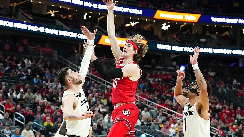 Mar 14, 2024; Las Vegas, NV, USA; Utah Utes center Branden Carlson (35) shoots between Colorado Buffaloes guard Luke O'Brien (0) and guard J'Vonne Hadley (1) during the second half at T-Mobile Arena. Mandatory Credit: Stephen R. Sylvanie-USA TODAY Sports