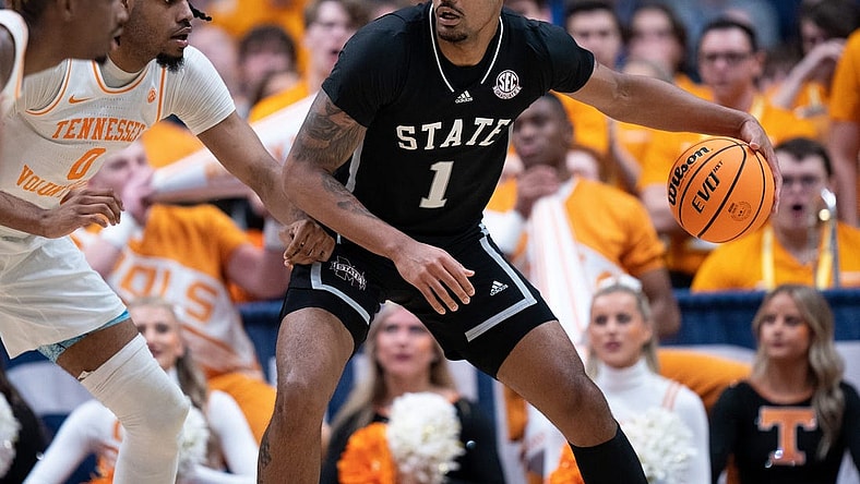 Mississippi State Bulldogs forward Tolu Smith (1) drives against Tennessee Volunteers forward Jonas Aidoo (0) during their SEC Men's Basketball Tournament quarterfinal game at Bridgestone Arena in Nashville, Tenn., Friday, March 15, 2024.