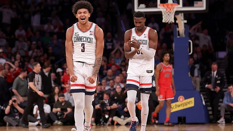 Mar 15, 2024; New York City, NY, USA; Connecticut Huskies forwards Jaylin Stewart (3) and Samson Johnson (35) react during the first half against the St. John's Red Storm at Madison Square Garden. Mandatory Credit: Brad Penner-USA TODAY Sports
